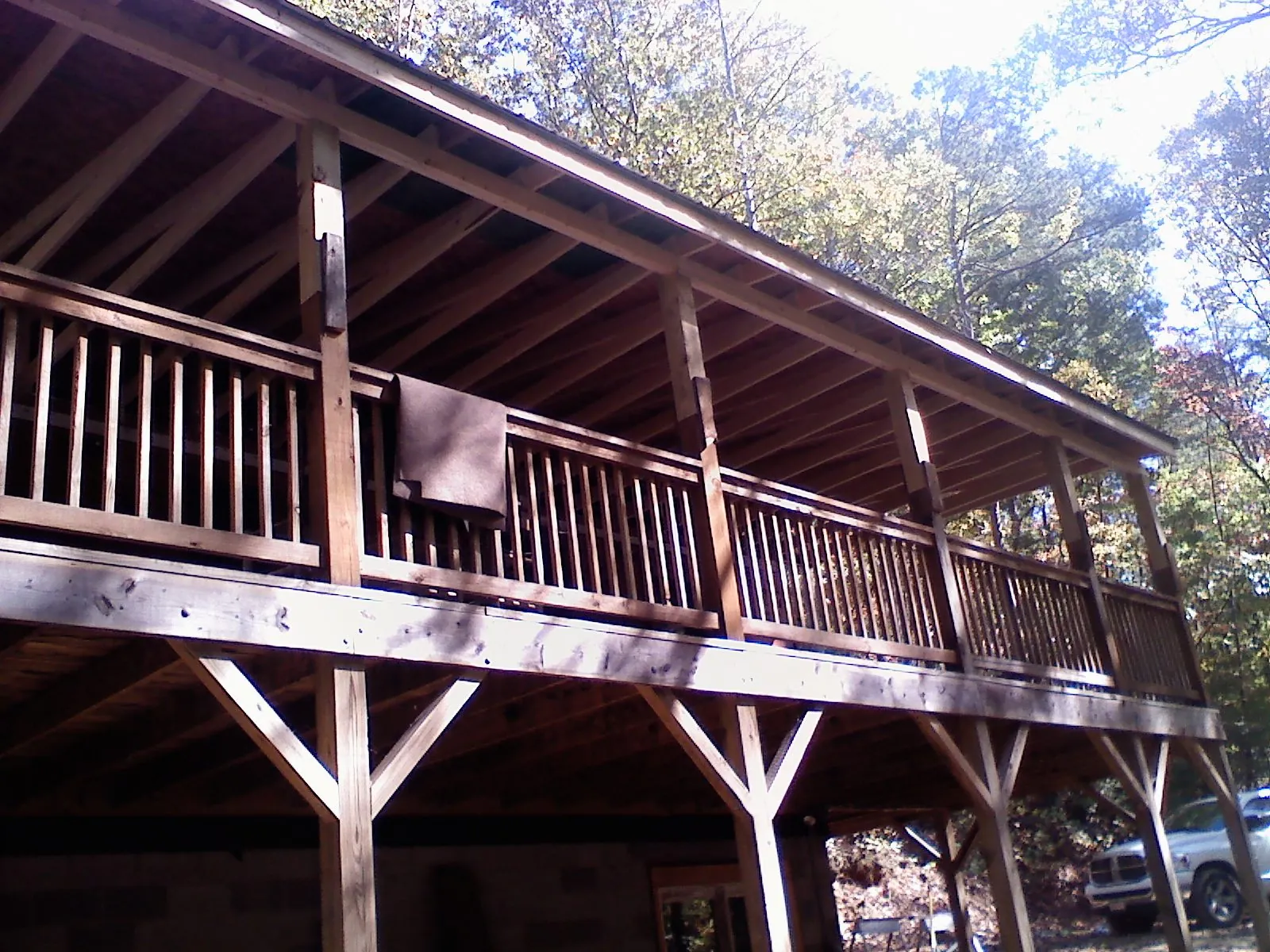 Timber framing under a new elevated porch and deck — Roof Leak Repair in Pawling by Roofing Brothers